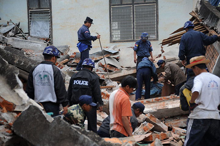 Myanmar earthquake: Myanmar policemen clear debris 