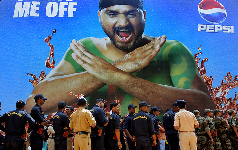 Cricket World Cup Crazy: Indian Police commandos stand in a queue