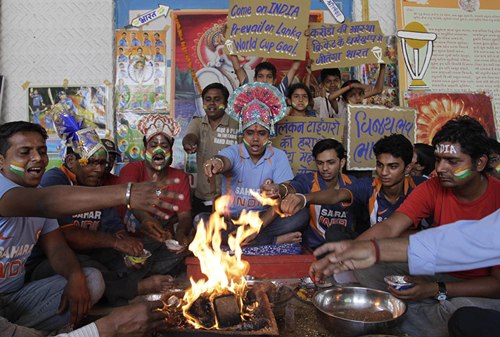 Cricket World Cup Crazy: Indian cricket fans perform rituals during a prayer ceremony
