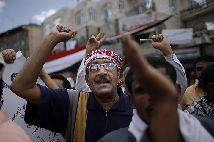 24 hours: Sana'a, Yemen: An anti-government protestor chants slogans during a demo