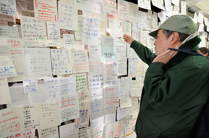 Japan disaster 1 month on: messages appealing for information on missing people in Natori
