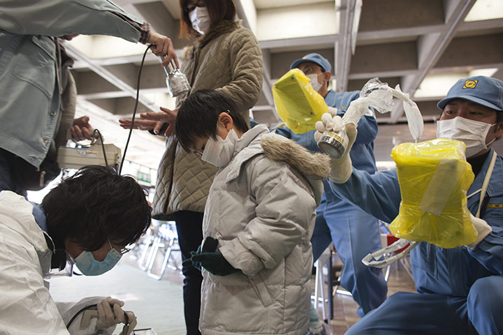 Fukushima disaster: 5 April:  Japanese people undergo a screening for possible radiation