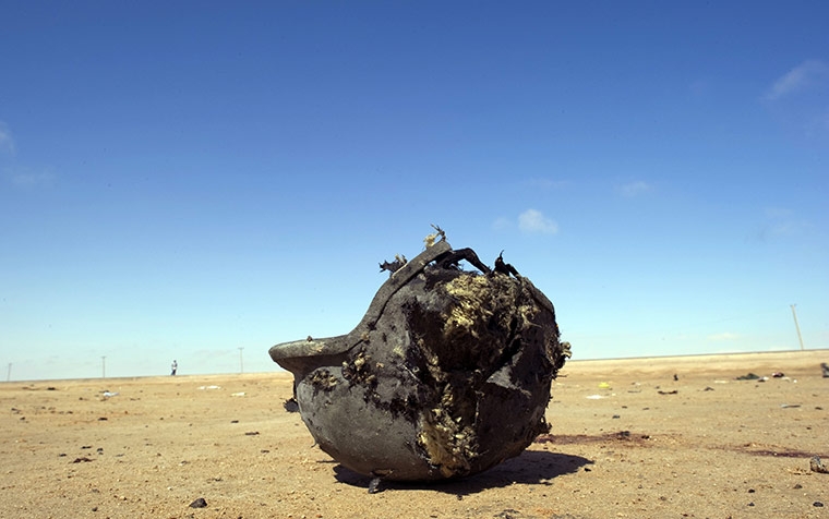 Ajdabiya, Libya : Helmet belonging to a killed fighter lies on the ground, Ajdabiya