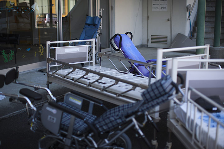 Fukushima exclusion zone: 12 April: Wheelchairs and hospital beds abandoned in Namie 