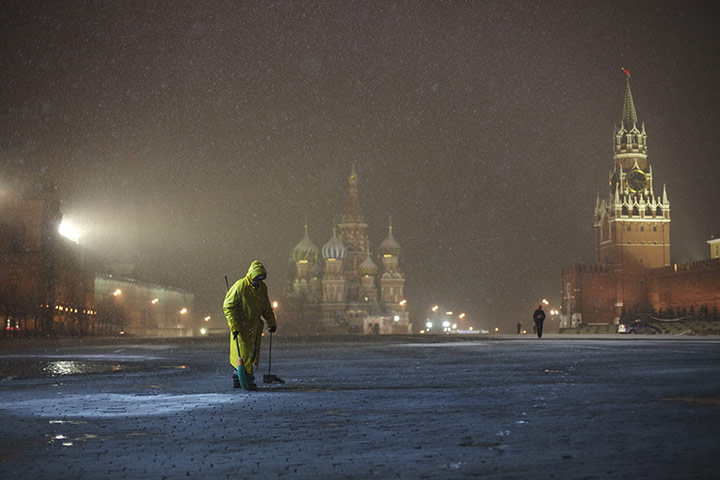 Week in Business: A municipal worker in the Red Square, Moscow, Russia