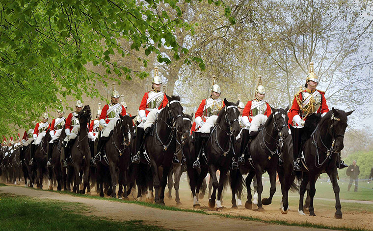 24 Hours in Pictures: Members of the Household Cavalry return to their barracks from Hyde Park