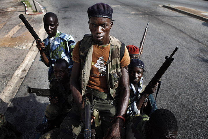 24 Hours in Pictures: Soldiers from the pro-Outtara Republican Force of Ivory Coast on patrol