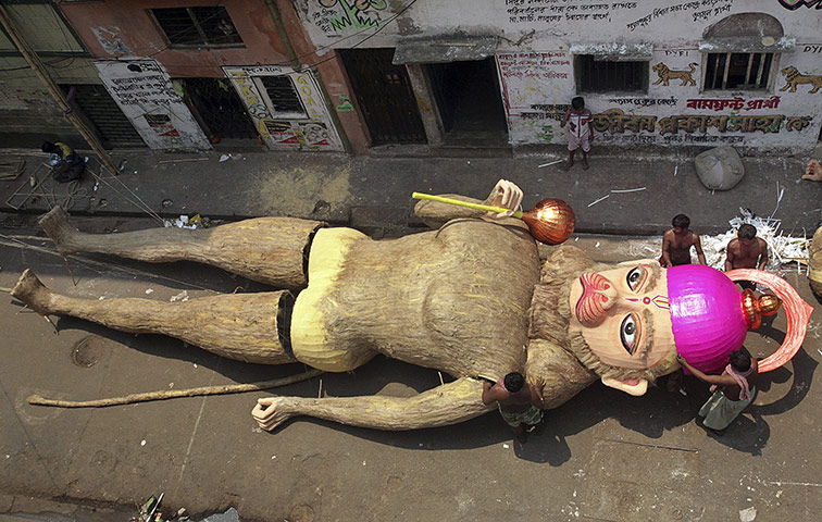 24 hours: Kolkata, India: Artists prepare 35 foot statue of Hindu monkey God Hanuman
