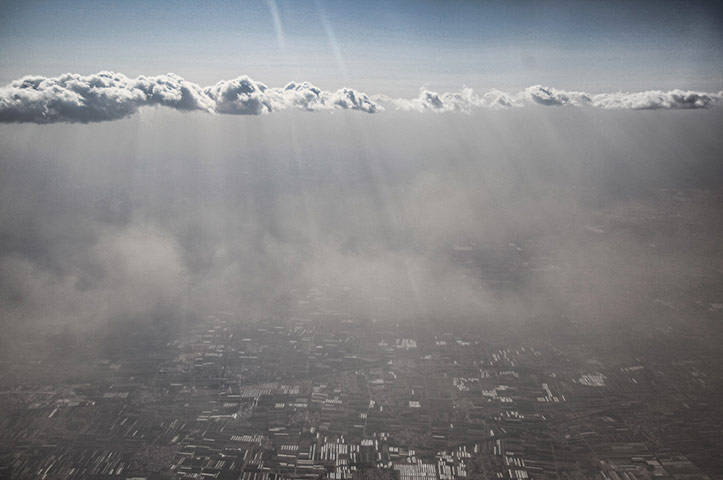24 hours in pictures: BESTPIX  Sandstorm Hits Beijing