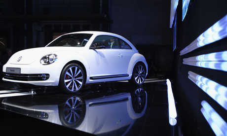 New Volkswagen Beetle VW's new model ditches the domed roof and 