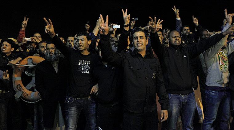  Misrata, Libya : Libyan men chant slogans supporting the revolution