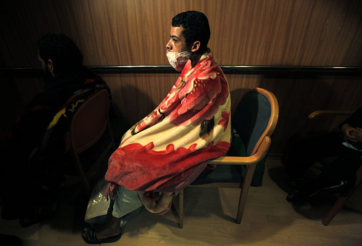  Misrata, Libya : On board a boat that evacuated foreign refugees and injured residents. 