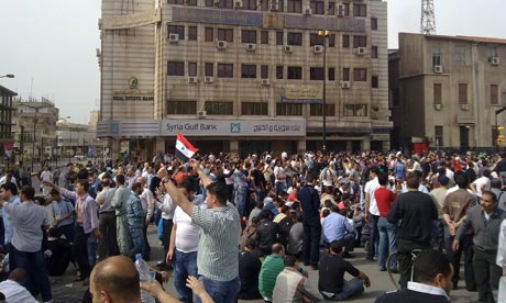 Syrians gather during a demonstration in Homs, Syria, on Monday.