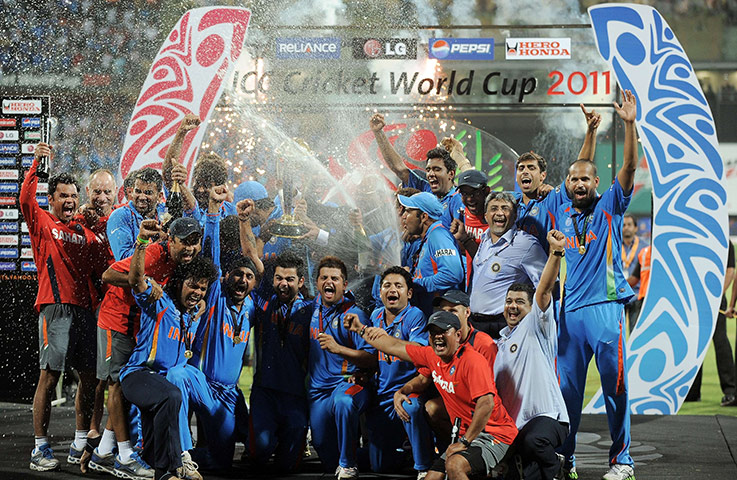 Cricket World Cup: Indian cricketers celebrate with the trophy