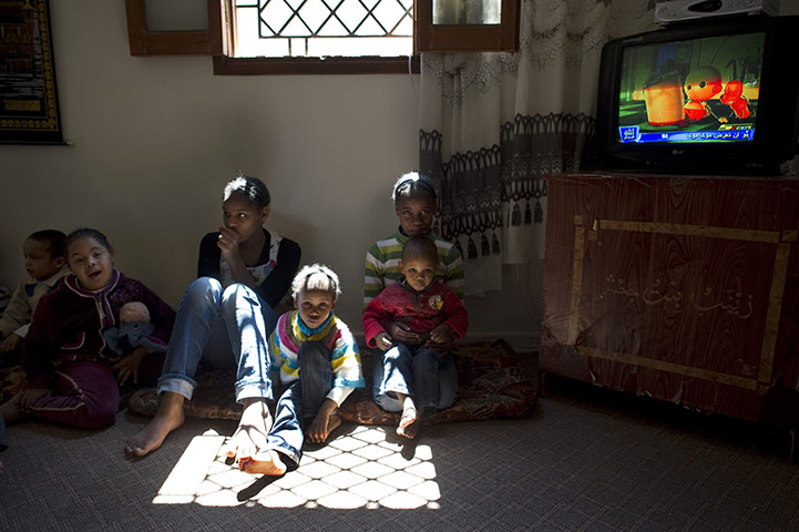 Life in masrata libya: Libyan orphans sit in a room of a makeshift orphanage
