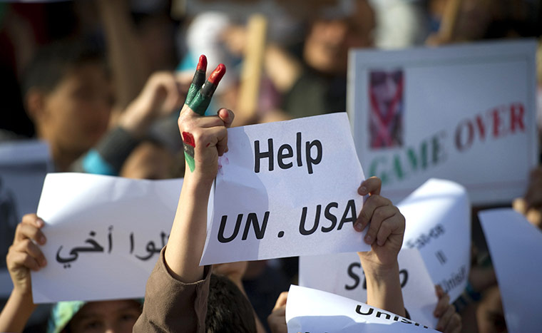 Life in masrata libya: A group of youth demonstrate n the besiged west Libyan city of Misrata