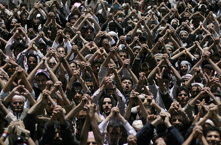 24 hours in pictures:  Anti-government protestors chant slogans in Sana'a