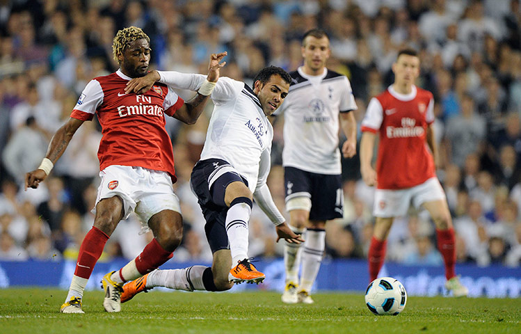 Spurs v Arsenal: Sandro beats Song to the ball