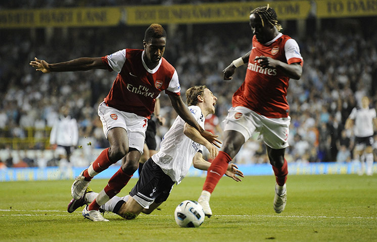 Spurs v Arsenal: Modric is blocked off by Djourou but no penalty is given