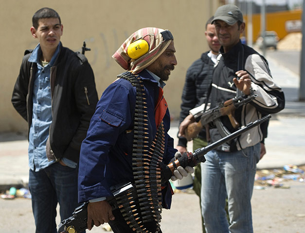 Misrata: In pictures: Libyan rebel fighters mill around at a side street next to Tripoli street
