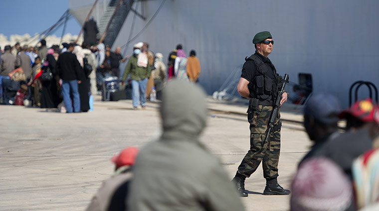 Misrata: In pictures: A Turkish soldier keeps watch over Niger nationals 