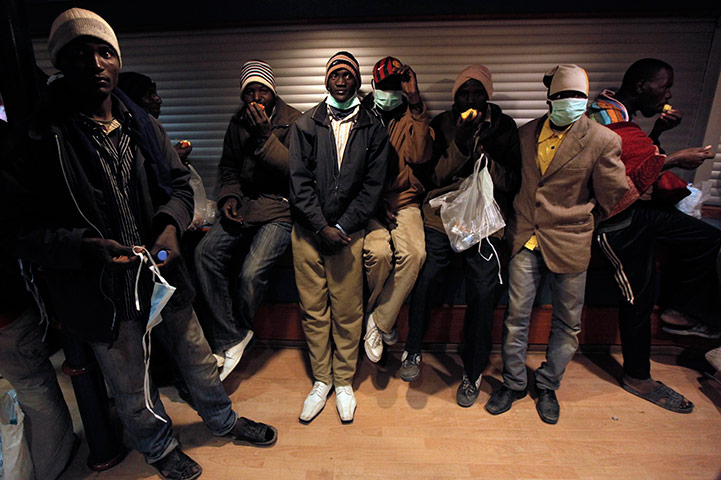 Misrata, libya:: Stranded foreign refugees on board a ship evacuating wounded Libyans 