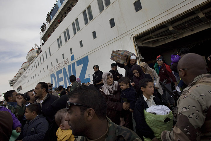 Misrata Libya: Evacuees arrive by ship in the port of Benghazi, Libya