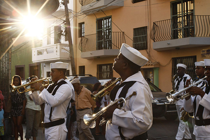 24 Hours: A sailor takes part in a 'Via Crucis' procession in Santo Domingo