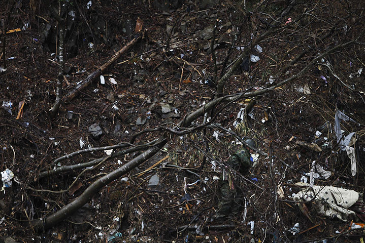 24 Hours: The search for victims continues at an area devastated by the tsunami