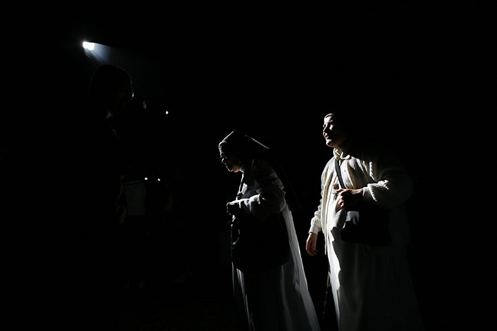 24 hours in pictures: Catholic nuns walk inside the Church of Holy Sepulchre 