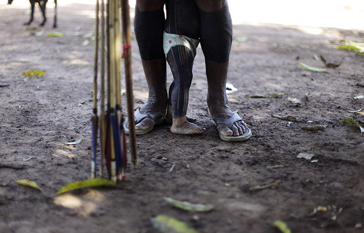 24 hours: A Kayapo girl with traditional body painting 