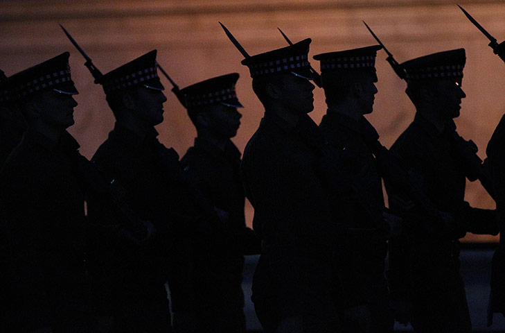 Royal Wedding rehearsal: Soldiers march outside Buckingham Palace during a Royal wedding rehearsal 
