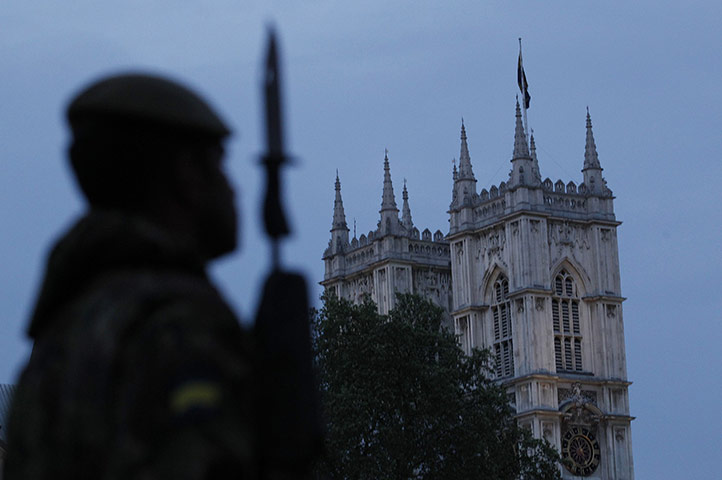 Royal Wedding rehearsal: A member of the British Armed Forces stands guard outside Westminster Abbey