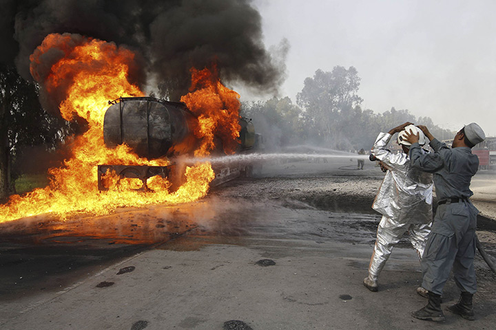 24 hours in pictures : burning tanker on the Jalalabad-Kabul highway