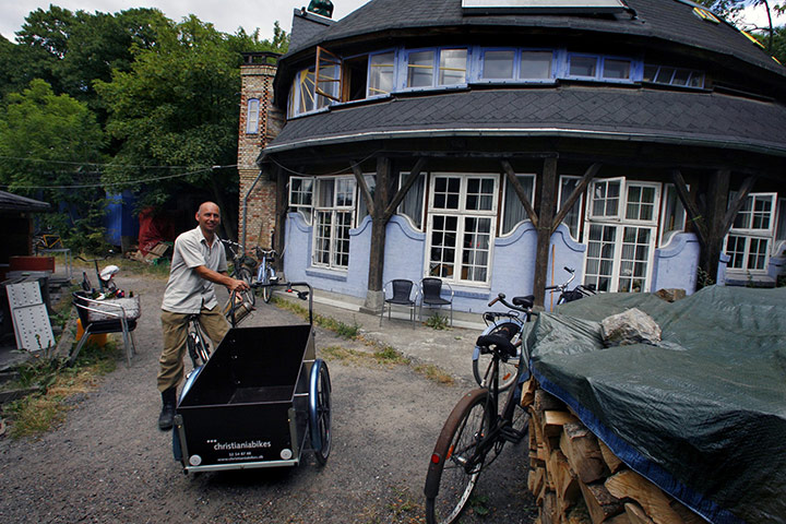 Christiania Copenhagen: A resident leaves his circular home in the Christiania district 