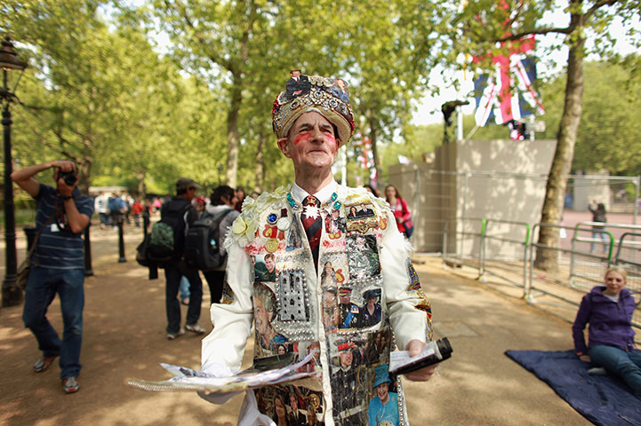 Preparations for wedding: Royal family fan William Willis walks along the Mall 