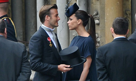 David And Victoria Beckham Kiss. David Beckham and Victoria