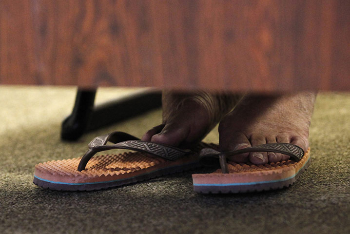 24 hours in pictures: The feet of Tibetan spiritual leader the Dalai Lama in Tokyo