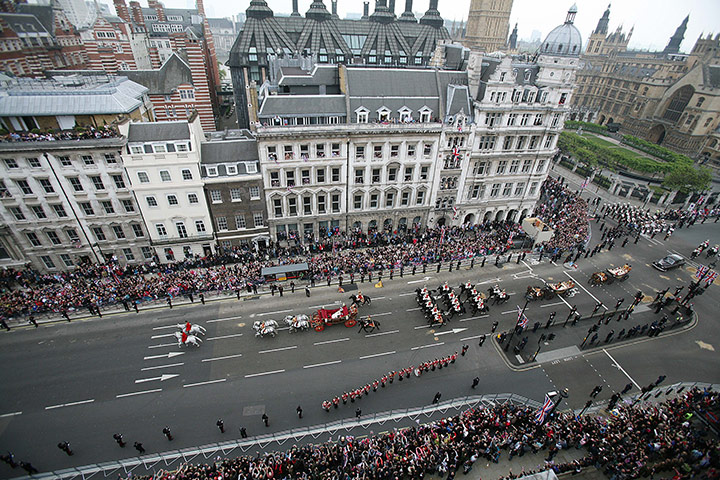 Wedding procession: Prince William and his new bride ride into Whitehall after the wedding 