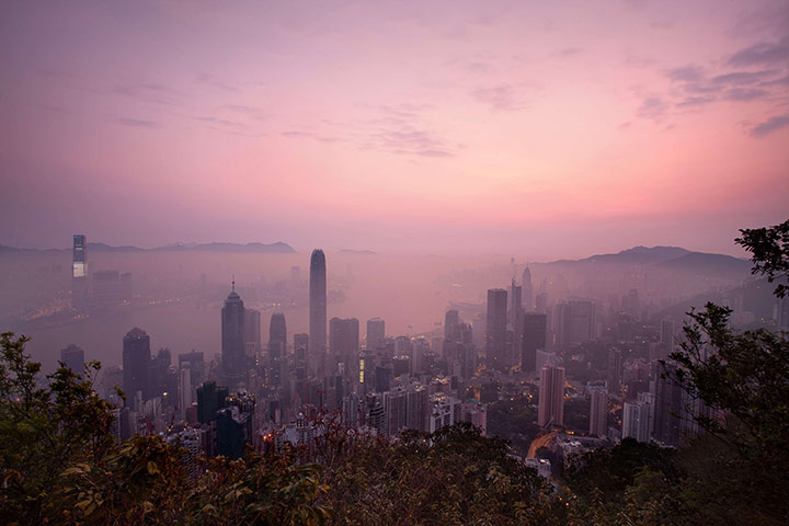 24 hours in pictures: Hong Kong, China: A blanket of haze hangs over the city's skyline