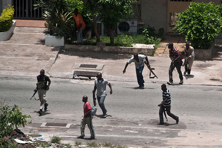 Ivory Coast Abidjan: 1 April: Pro-Gbagbo militiamen from the Young Patriots fight 