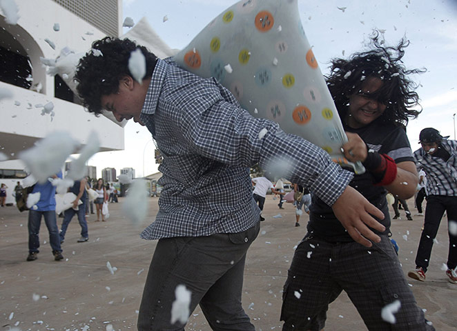 Pillow fight day: Brasilia, Brazil: People participate in a flashmob pillow fight 