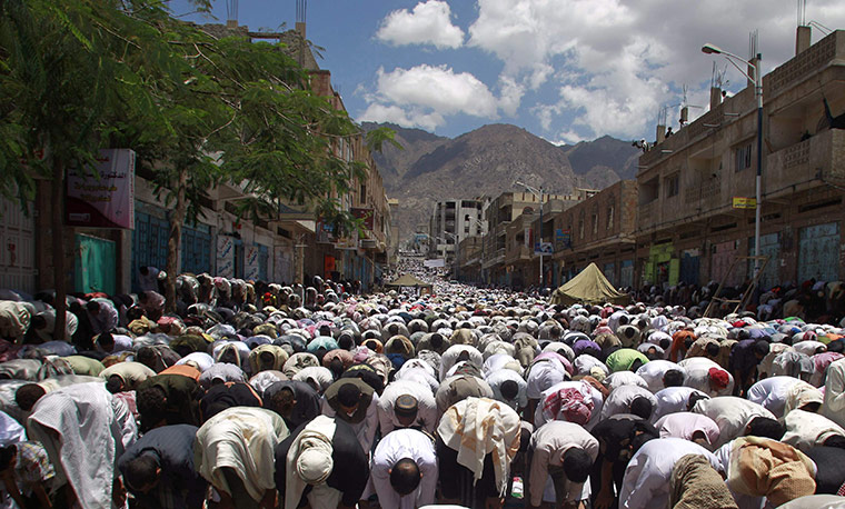 24 Hours: Anti-government protesters perform the Friday weekly prayers in Taiz