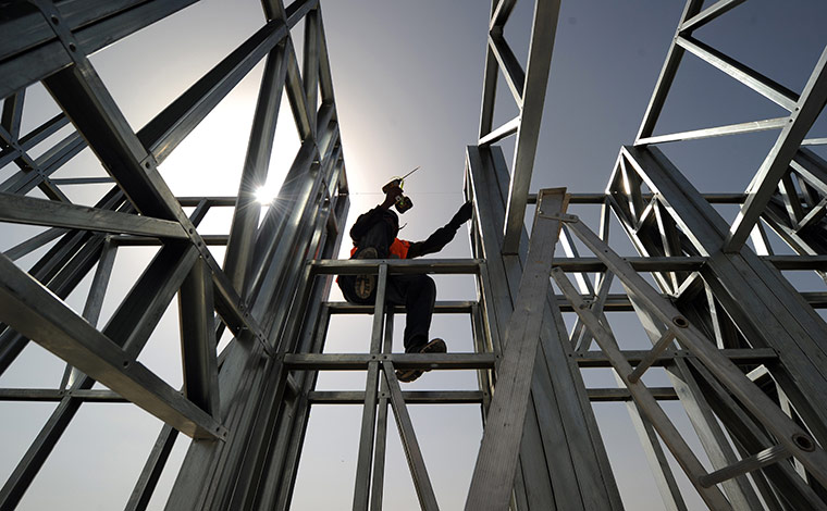 24 hours in pictures: Contractors from the Philippines build a Christian church, Afghanistan
