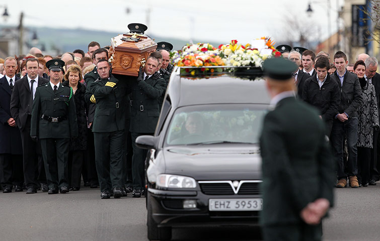 Ronan Kerr Funeral: Police officers carry the coffin through Berlagh