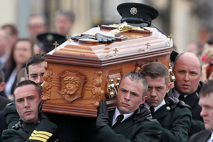 Ronan Kerr Funeral: Police officers carry the coffin through Berlagh