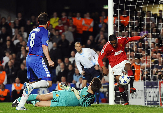Chelsea v United: Patrice Evra clears the ball off the line from Frank Lampard's shot