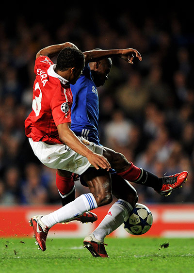 Chelsea v United: Chelsea's Ramires is brought down by Manchester United's Patrice Evra