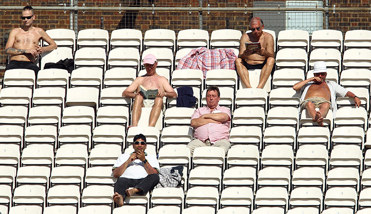 April Hot Weather: Spectators at the match between Surrey and Northants