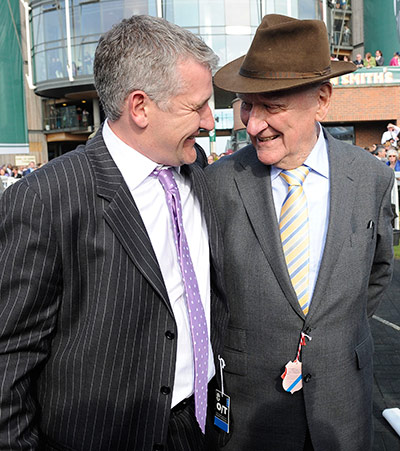 Grand National: Wining trainer Donald McCain embraces his father Ginger McCain 